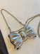 Metallic Bow Beaded Chain Bag