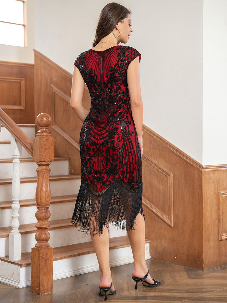 This 1920s Floral Pattern Sequined Tassel Dress wraps her in 1920s elegance, one twirl at a time