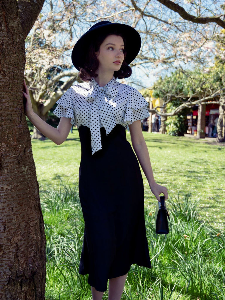 She slips into this 1930s Dots Tie Neck Mermaid Dress and suddenly it's a 1930s daydream