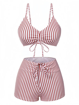 She's wearing 1930s Drawstring Straps Vertical Stripe Boxer Bikini and the whole beach remembers the 1930s