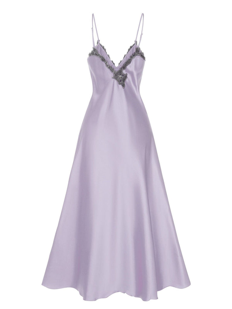 This 1930s Embroidered Faux Satin Strap Nightgown wraps her in 1930s elegance, one twirl at a time