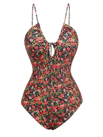 She's wearing 1930s Spaghetti Strap Ditsy Floral One-Piece Swimsuit and the whole beach remembers the 1930s