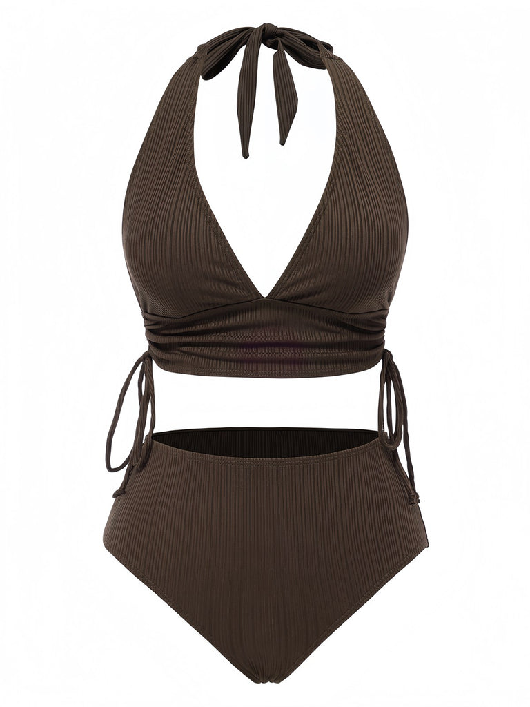 She's wearing 1930s Textured Fabric Solid Halter Lace-Up Swimsuit and the whole beach remembers the 1930s