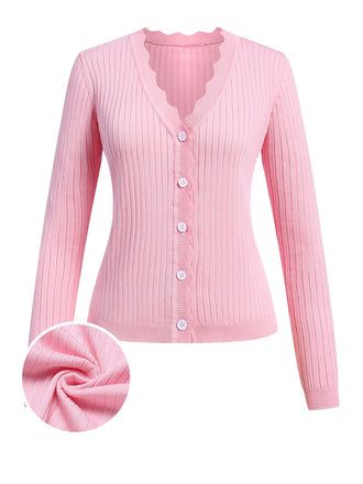 She throws on this 1930s V-Neck Ruffles Long Sleeve Sweater Coat and the city feels like 1930s Paris