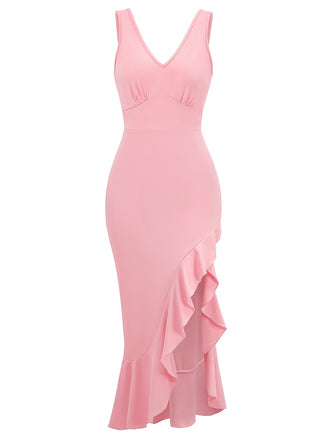 She slips into this 1930s V-Neck Sleeveless Ruffled Fishtail Dress and suddenly it's a 1930s daydream