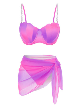 She's wearing 1940s Color Gradient Shell Bikini Set & Cover-Up and the whole beach remembers the 1940s