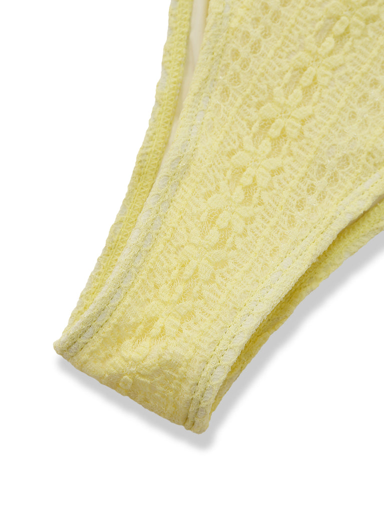 Close-up of a textured yellow fabric on a white background