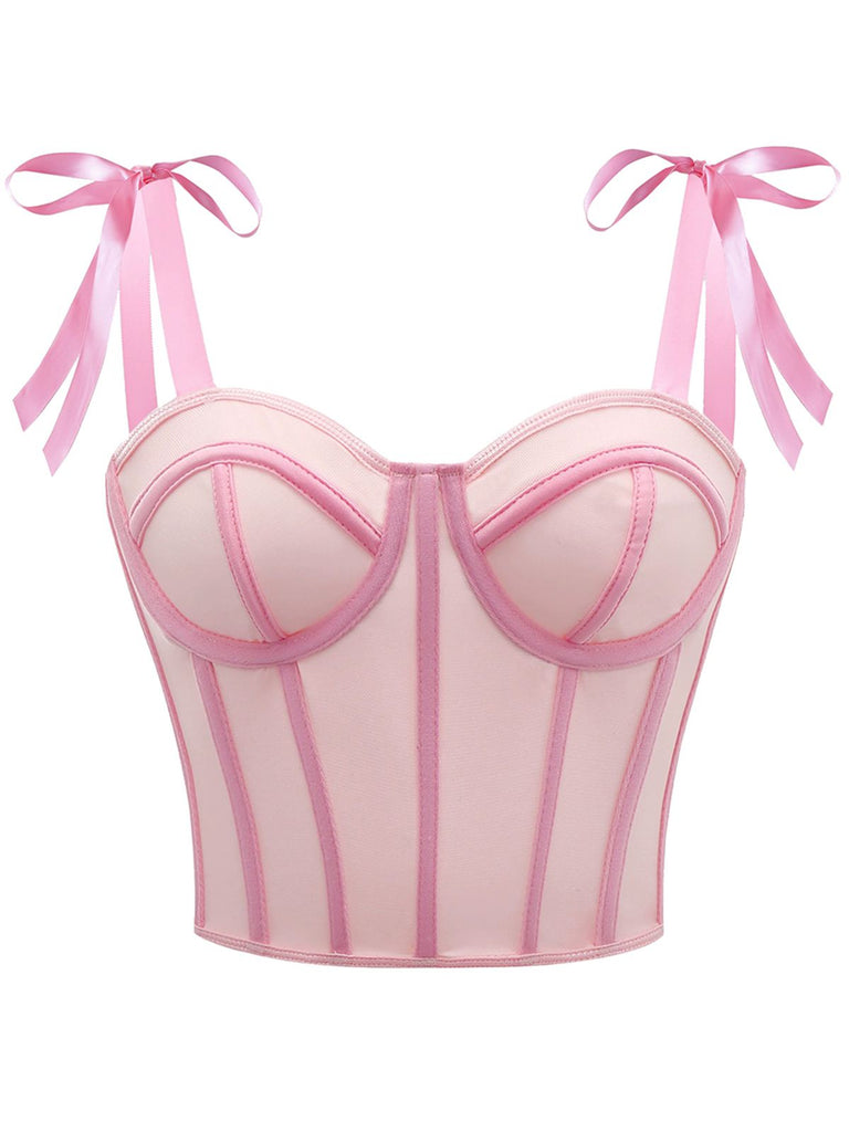 She pairs this 1940s Lace-Up Bow Mesh Corset Crop Camisole with confidence and 1940s charm