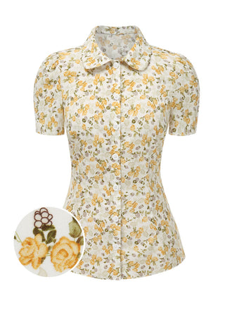 She pairs this 1940s Peter Pan Collar Ditsy Floral Blouse with confidence and 1940s charm