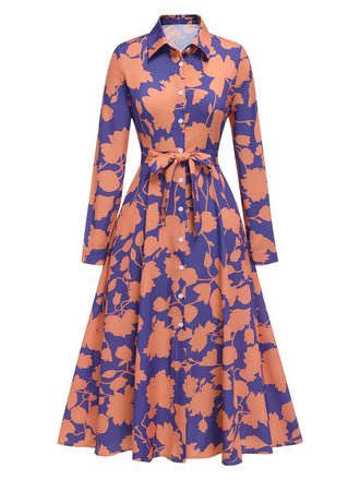 She slips into this 1940s Shirt Neck Floral Belted Dress and suddenly it's a 1940s daydream
