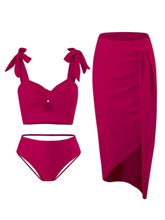 She's wearing 1940s Solid Shoulder Tie Hollow Swimsuit & Cove-Up and the whole beach remembers the 1940s
