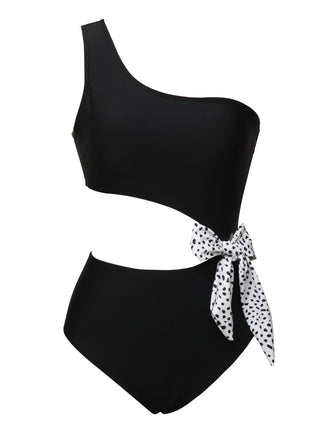 She's wearing 1940s Solid Waist Hollow Dots Bow Patchwork Swimsuit and the whole beach remembers the 1940s