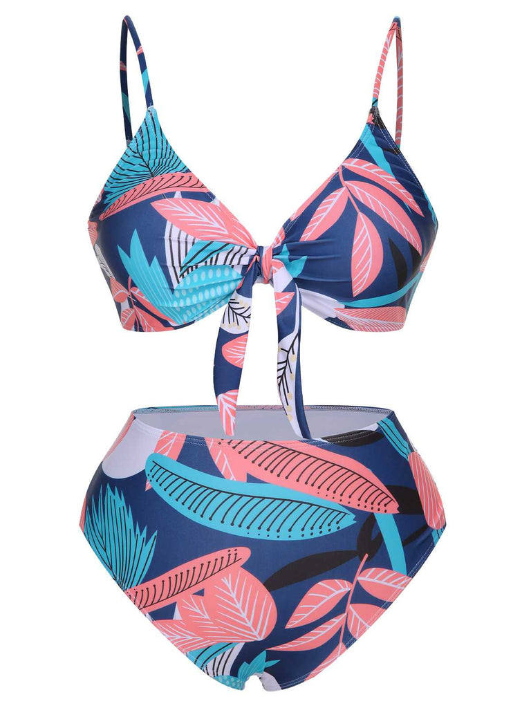 She's wearing 1940s Spaghetti Strap Print Swimsuit & Cover-Up and the whole beach remembers the 1940s
