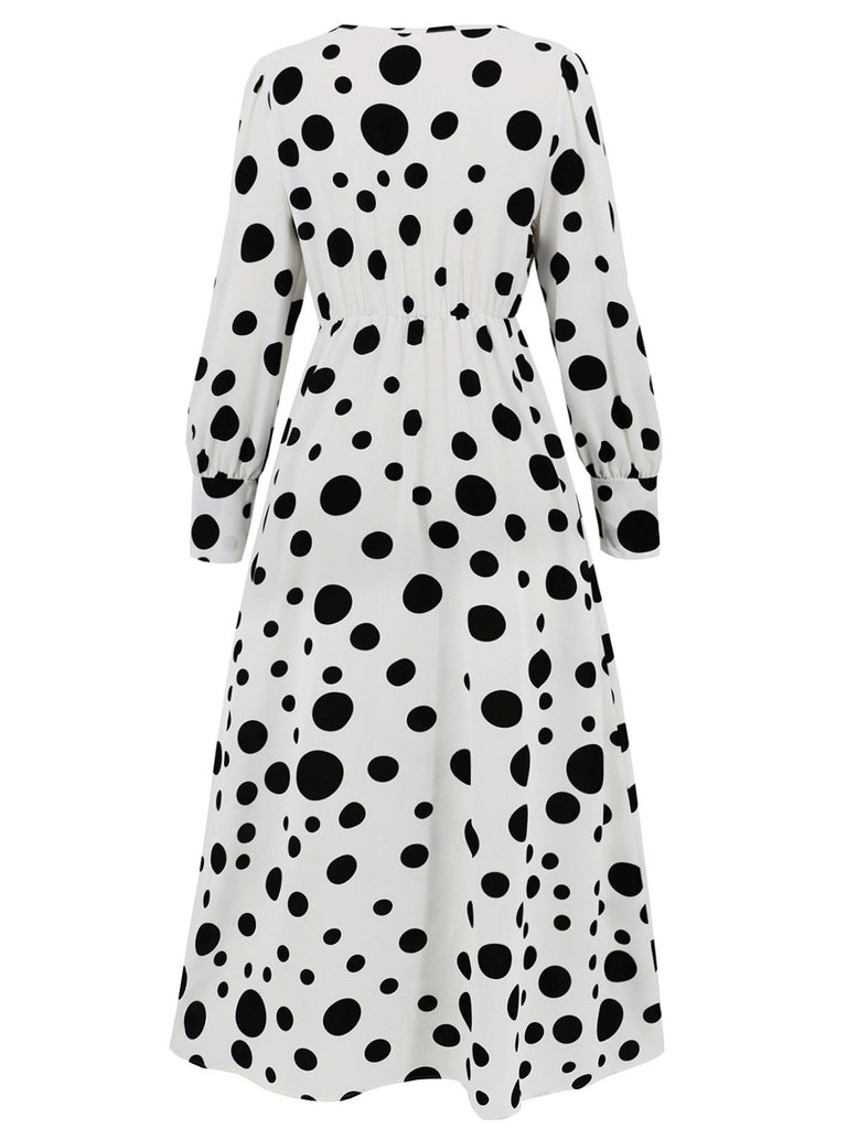 She slips into this 1940s Vintage Polka Dots Long Sleeve Slit Dress and suddenly it's a 1940s daydream