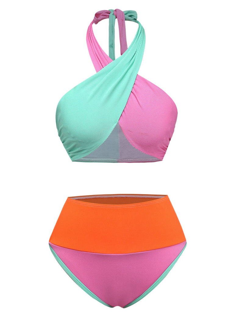 Colorful bikini set with pink, green, and orange sections on a white background
