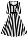 She slips into this 1950S Lapel Black & White Stripes Dress and suddenly it's a 1950s daydream