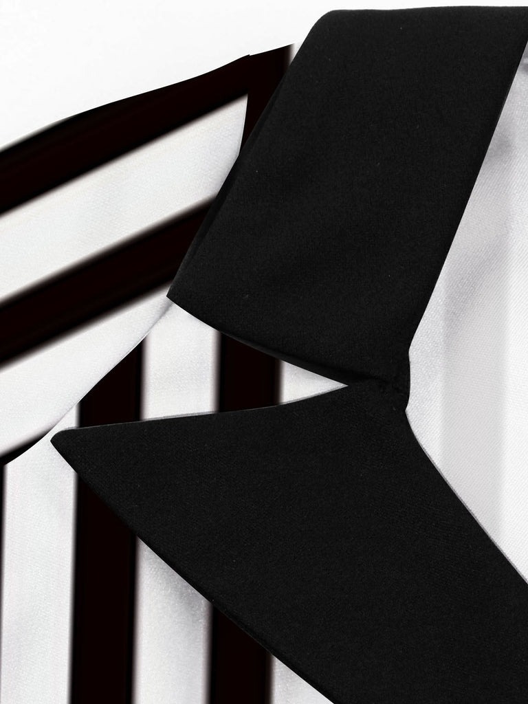 This 1950S Lapel Black & White Stripes Dress wraps her in 1950s elegance, one twirl at a time