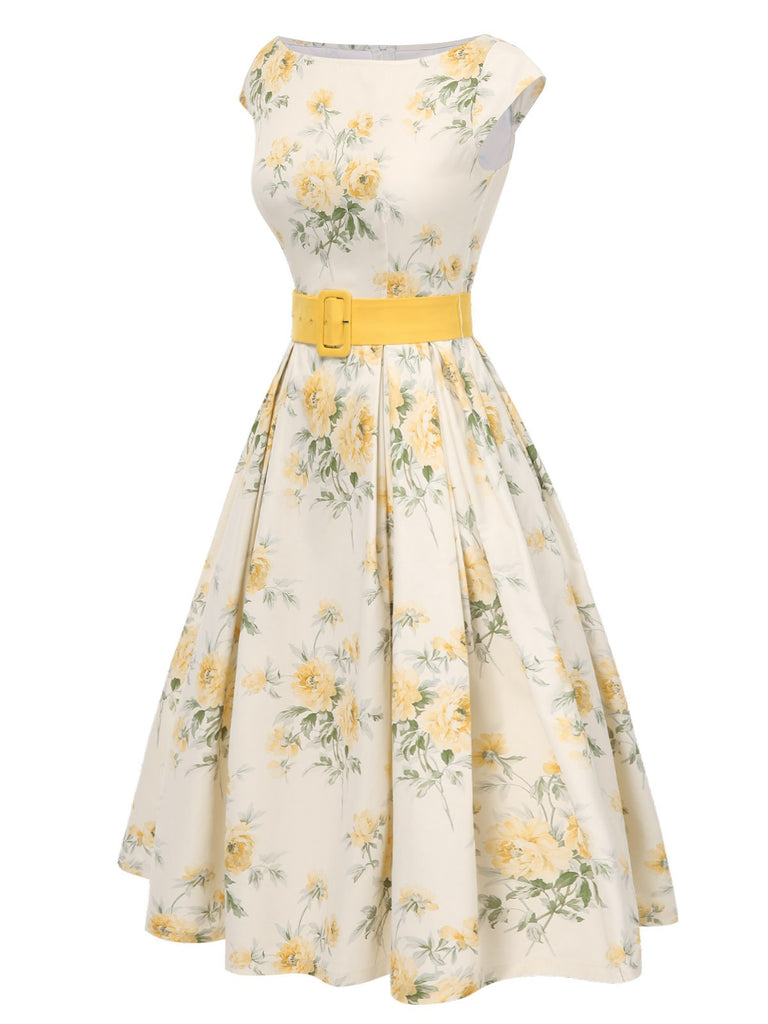 This Yellow 1950s Boat Neck Antique Floral Dress wraps her in 1950s elegance, one twirl at a time