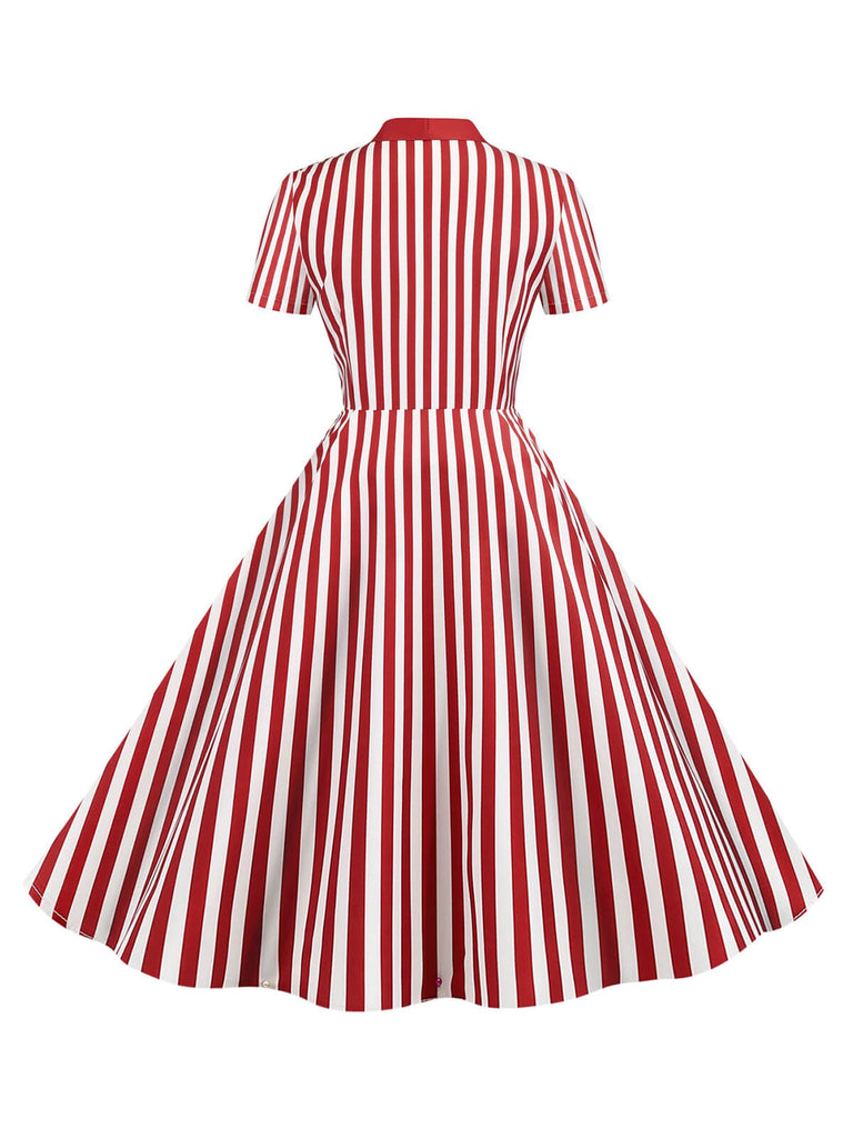 She slips into this 1950s Bow Collar Striped Dots Swing Dress and suddenly it's a 1950s daydream