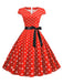 1950s Cap Sleeve Polka Dot Belted Dress — the kind of 1950s dress that makes strangers smile