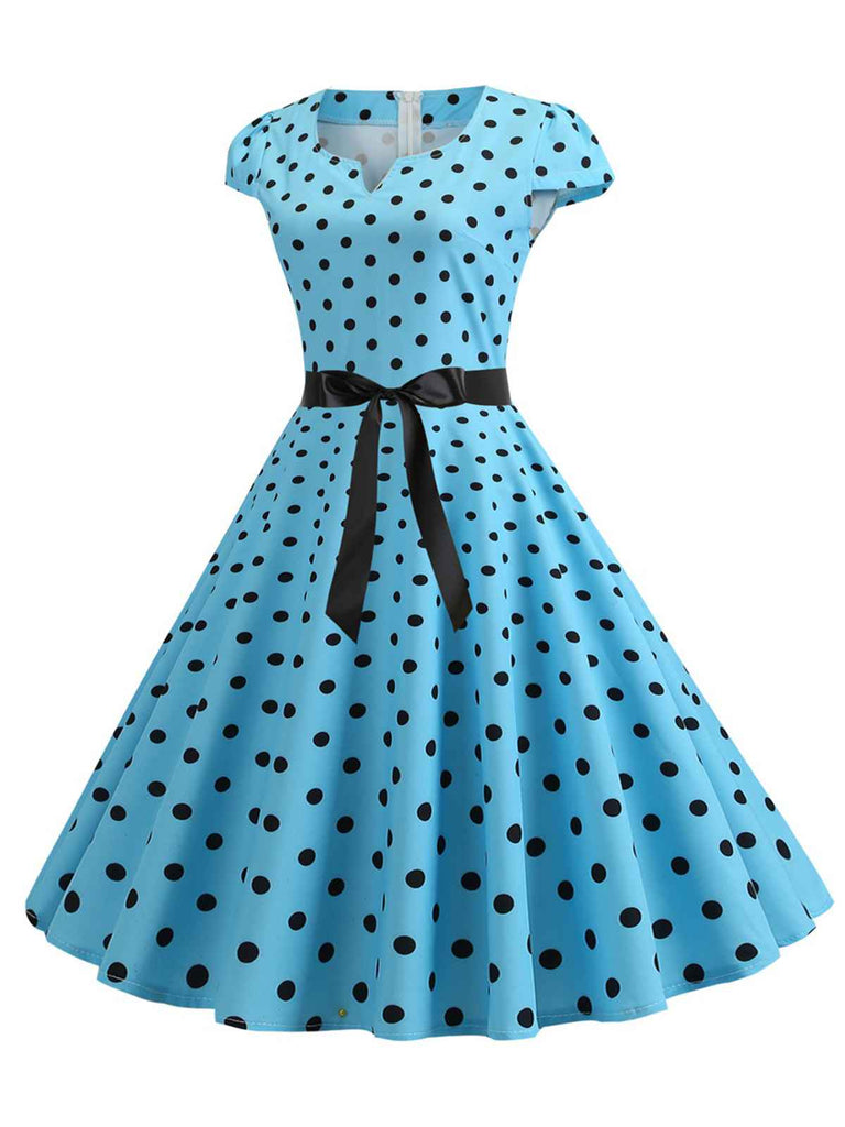 1950s Cap Sleeve Polka Dot Belted Dress — a 1950s silhouette that turns sidewalks into runways