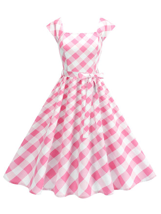 She slips into this 1950s Cap Sleeves Argyle Plaid Swing Dress and suddenly it's a 1950s daydream