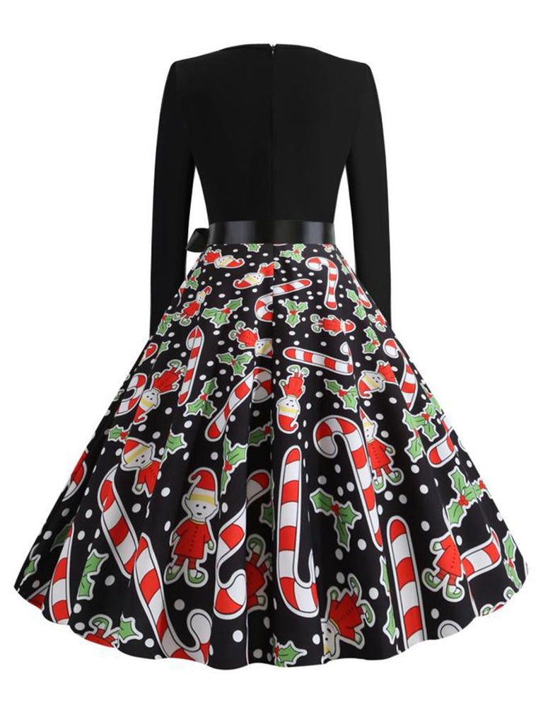 This 1950s Christmas Candy Canes Swing Dress wraps her in 1950s elegance, one twirl at a time