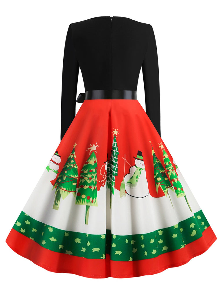 She slips into this 1950s Christmas Patchwork Swing Dress and suddenly it's a 1950s daydream