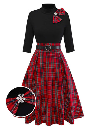 She slips into this 1950s Christmas Plaid Belted Dress With Snowflake Brooch and suddenly it's a 1950s daydream
