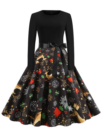 She slips into this 1950s Christmas Print Belted Dress and suddenly it's a 1950s daydream