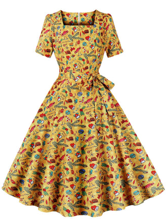 She slips into this 1950s Christmas Square Collar Patchwork Dress and suddenly it's a 1950s daydream