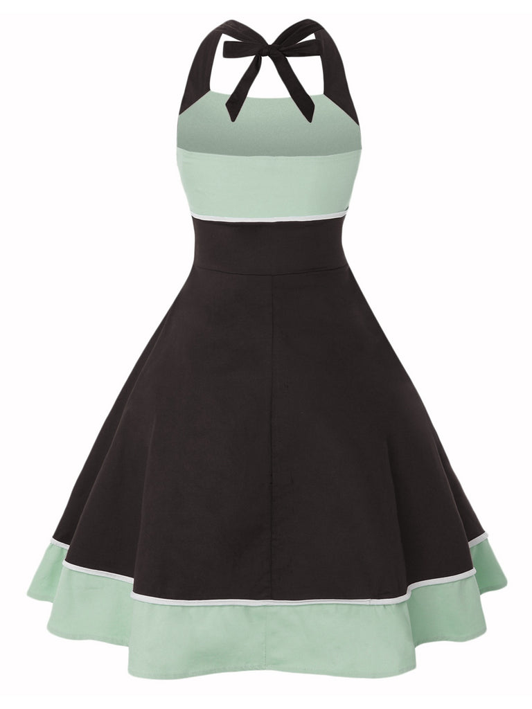 She slips into this 1950s Contrast Polka Dot Patchwork Halter Dress and suddenly it's a 1950s daydream