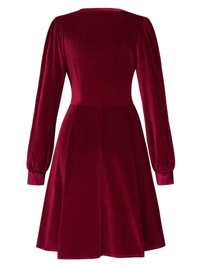 She slips into this 1950s Deep V-Neck Velvet Button Solid Dress and suddenly it's a 1950s daydream