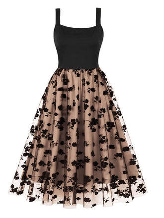 She slips into this 1950s Floral Flocked Mesh Swing Dress and suddenly it's a 1950s daydream
