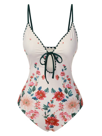 She's wearing 1950s Floral Print Spaghetti Strap One-Piece Swimsuit and the whole beach remembers the 1950s