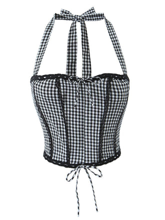 She pairs this 1950s Gingham Plaid Lace-Up Halter Crop Camisole with confidence and 1950s charm