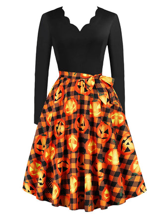 She slips into this 1950s Halloween Pattern Wave Neck Patchwork Dress and suddenly it's a 1950s daydream