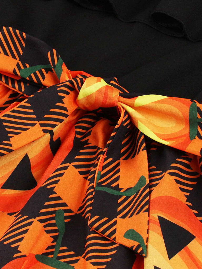 This 1950s Halloween Pattern Wave Neck Patchwork Dress wraps her in 1950s elegance, one twirl at a time