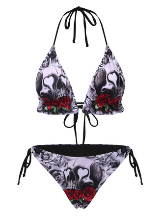 She's wearing 1950s Halter Gothic Skull Roses Swimsuit and the whole beach remembers the 1950s