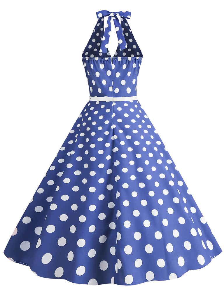 She slips into this 1950s Halter Polka Dot Print Swing Dress and suddenly it's a 1950s daydream