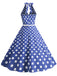 She slips into this 1950s Halter Polka Dot Print Swing Dress and suddenly it's a 1950s daydream