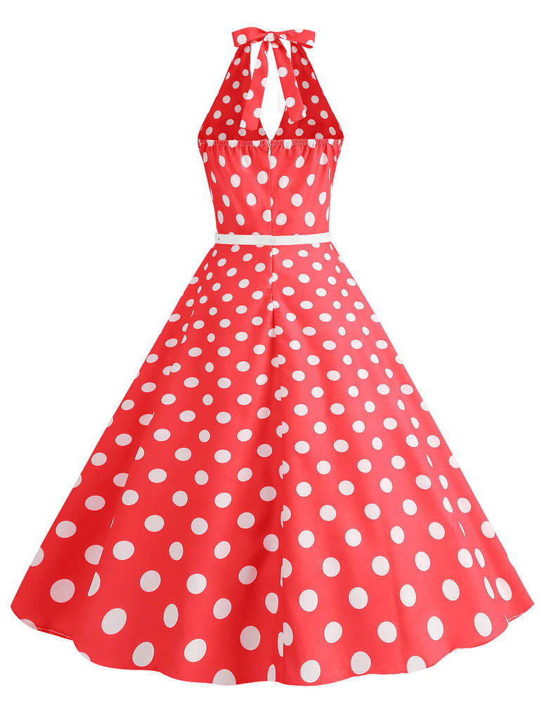 She slips into this 1950s Halter Polka Dot Print Swing Dress and suddenly it's a 1950s daydream
