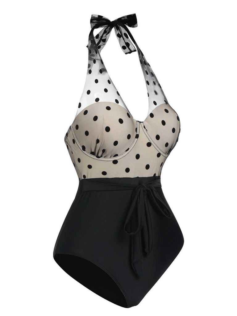 This Black 1950s Halter Polka Dots Mesh Swimsuit carries 1950s vacation dreams in every stitch