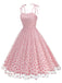 She slips into this 1950s Heart Mesh Patchwork Suspender Dress and suddenly it's a 1950s daydream