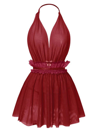 She slips into this 1950s Lace Mesh Deep V-Neck Halter Nightgown and suddenly it's a 1950s daydream