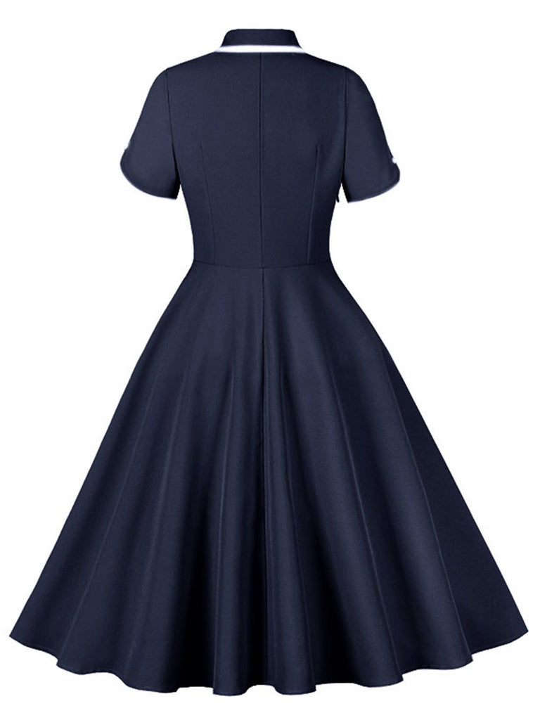 1950s Lapel Buttoned Short Sleeve Solid Dress: where 1950s romance meets her modern spirit