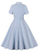 She slips into this 1950s Lapel Buttoned Short Sleeve Solid Dress and suddenly it's a 1950s daydream