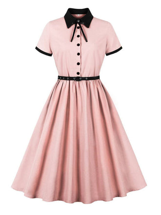 She slips into this 1950s Lapel Colorblock Swing Shirt Dress and suddenly it's a 1950s daydream