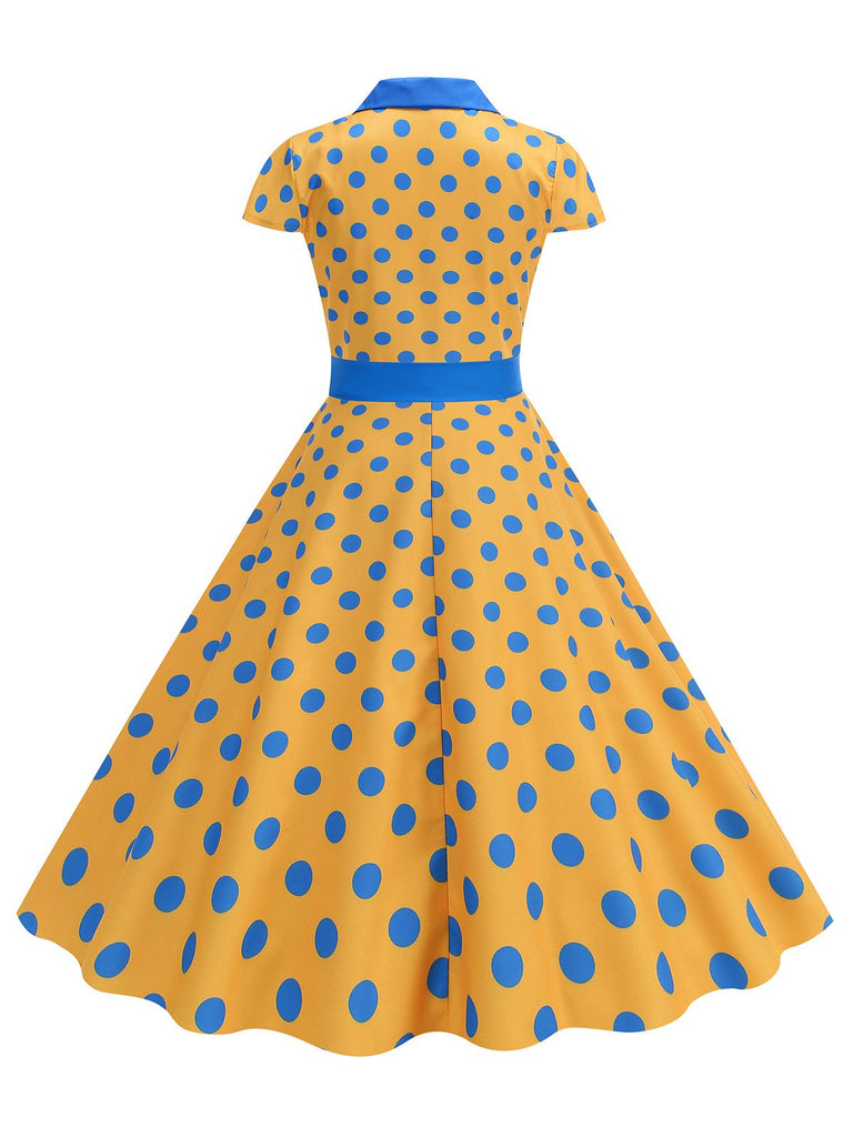 She slips into this 1950s Lapel Polka Dots Bow Swing Dress and suddenly it's a 1950s daydream