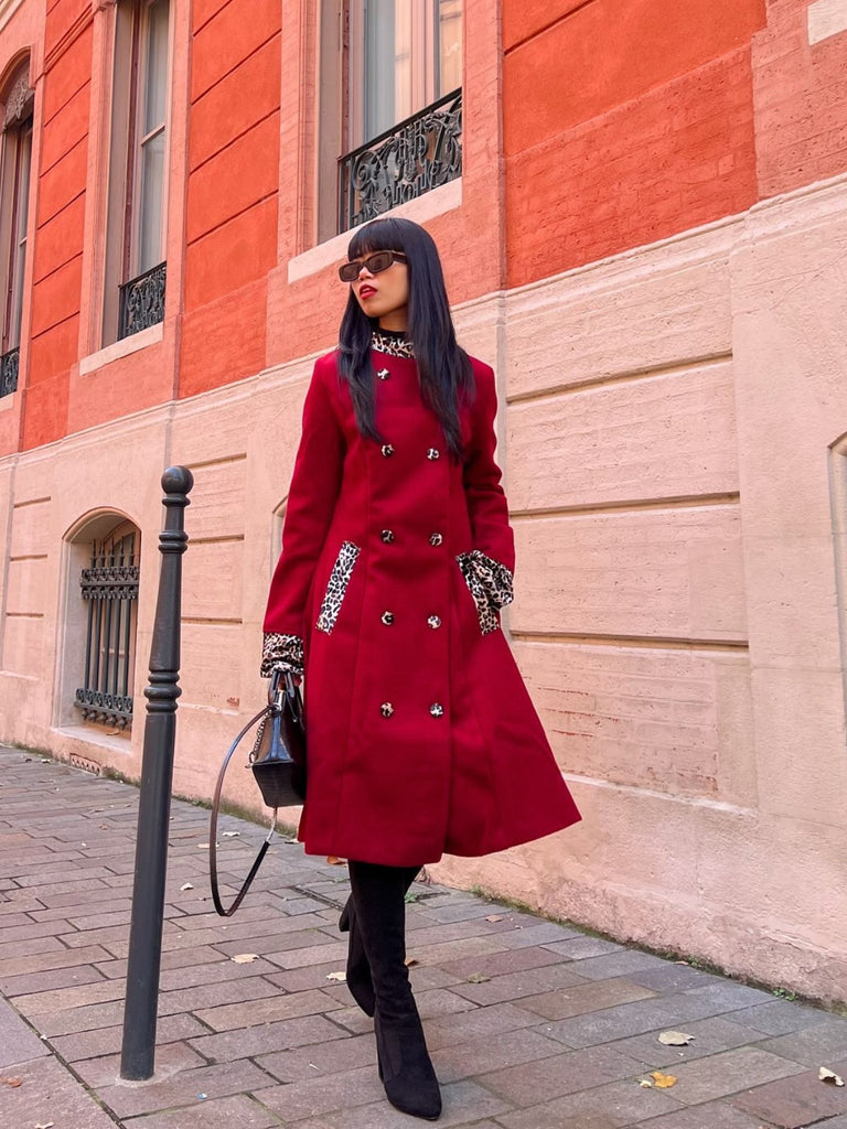 She throws on this 1950s Leopard Patchwork Button Coat and the city feels like 1950s Paris